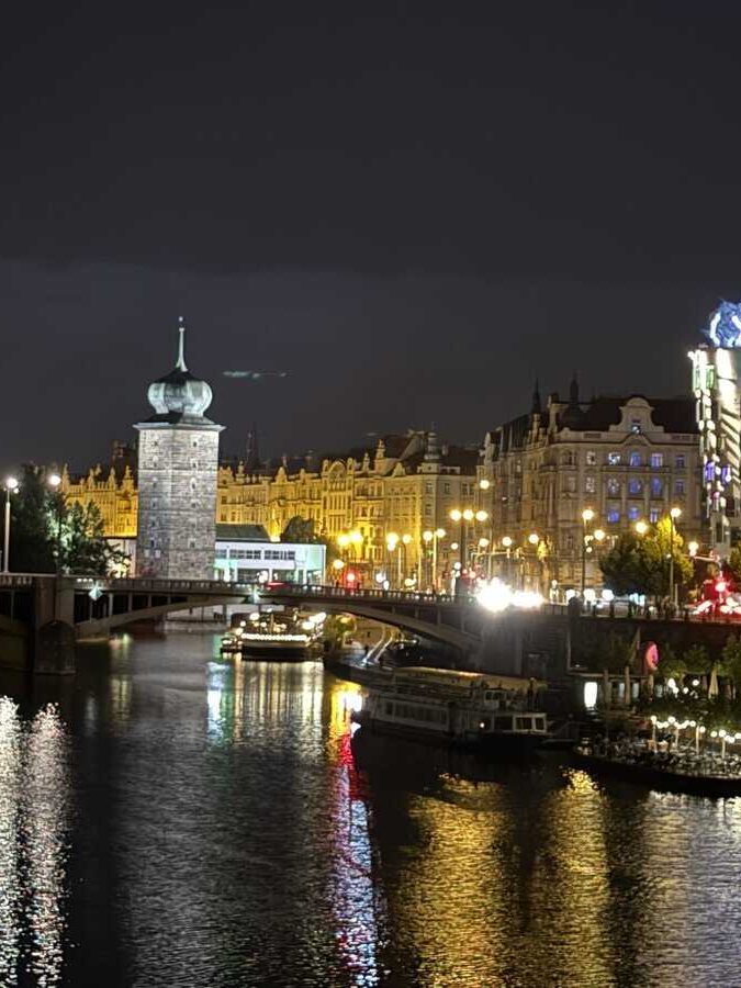 Dinner cruise on Vltava(Moldau) with Bohemia. Dancing house in the background, to the right