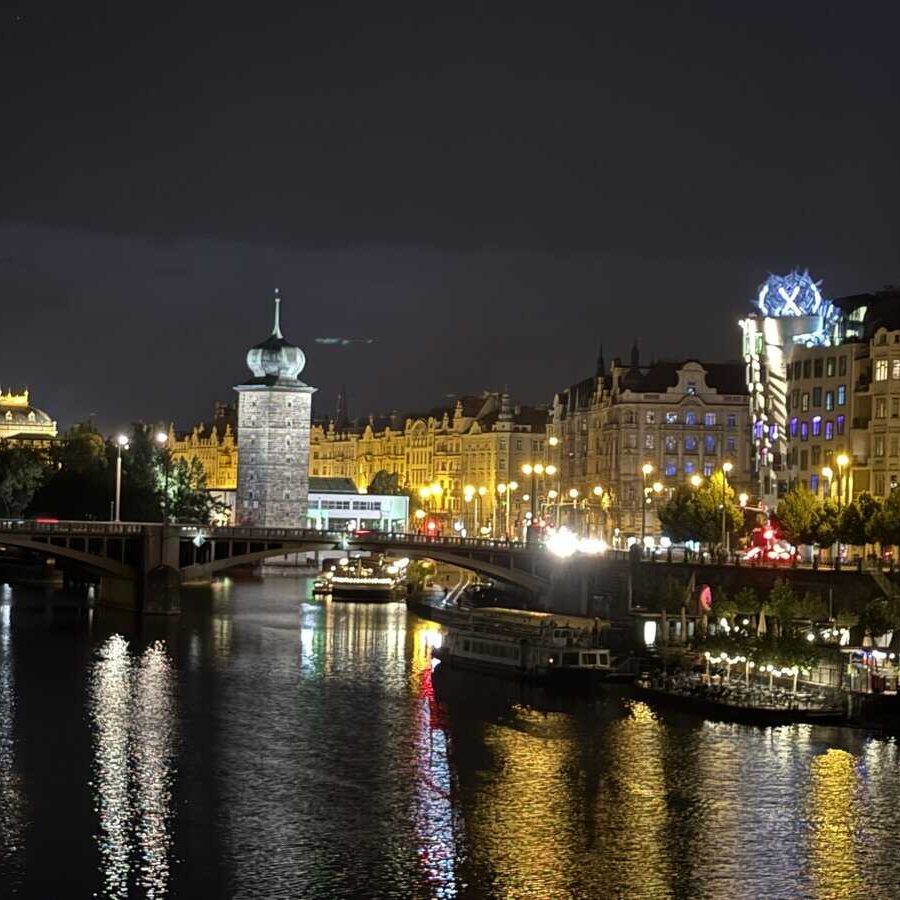 Dinner cruise on Vltava(Moldau) with Bohemia. Dancing house in the background, to the right